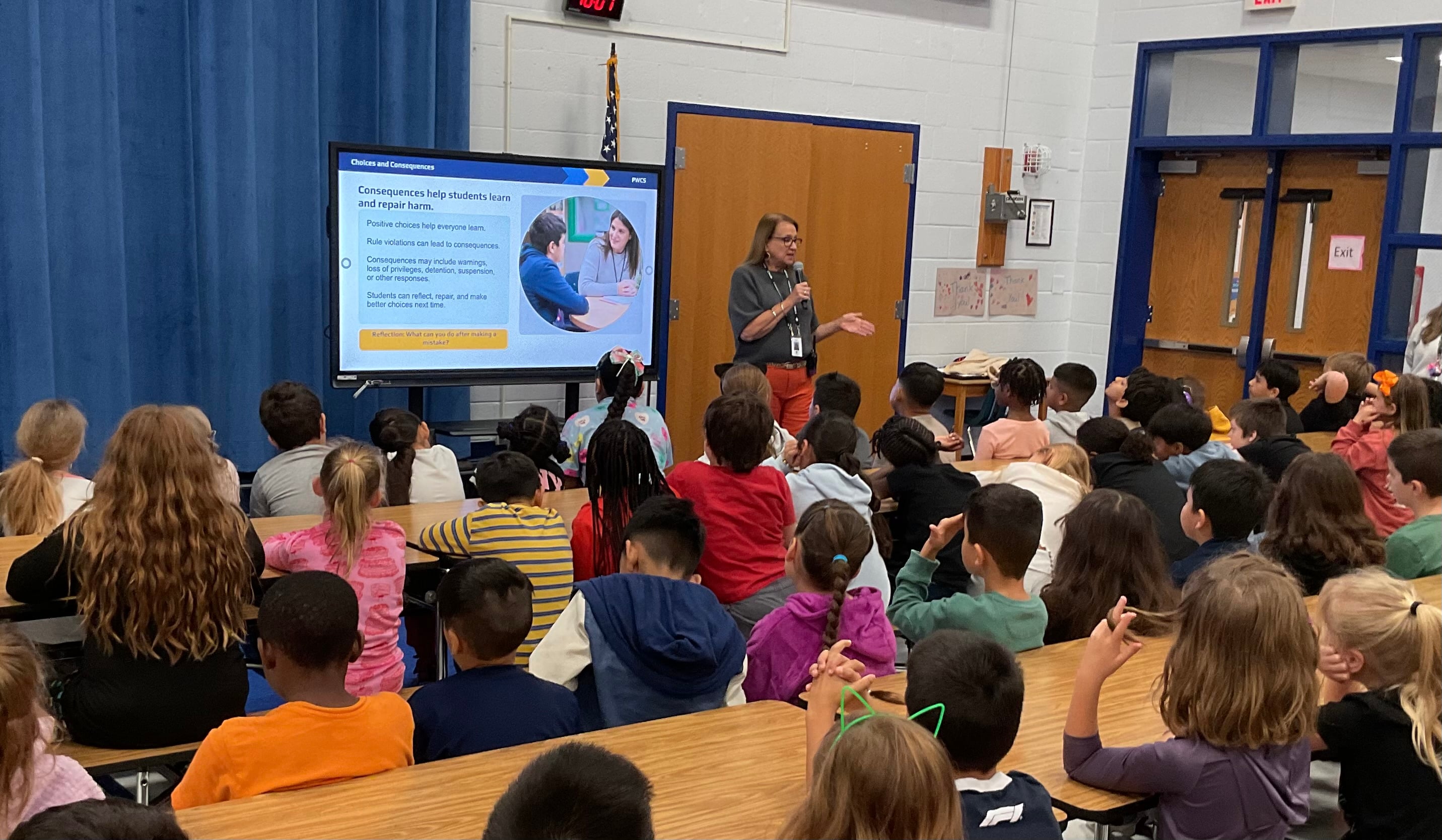 Our Acting Principal, Mrs. Jeck, shares with a group of students about supports available for students. 